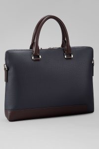 elevate your workplace presence with a bag that…